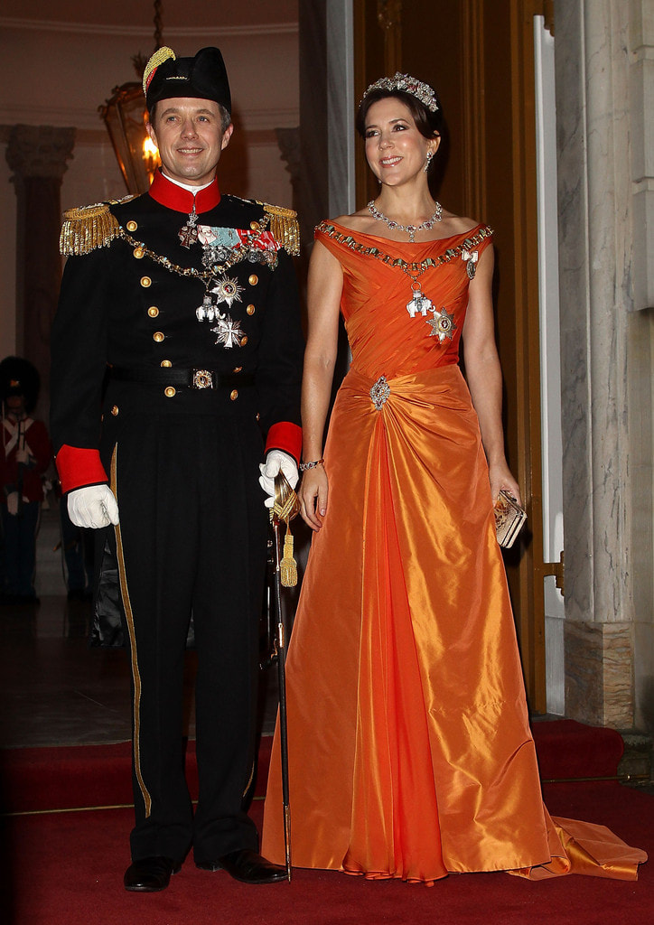 Celebrating Crown Princess Mary of Denmark's 50th birthday in 50 elegant day dresses and evening gowns: Princess Mary in orange evening gown