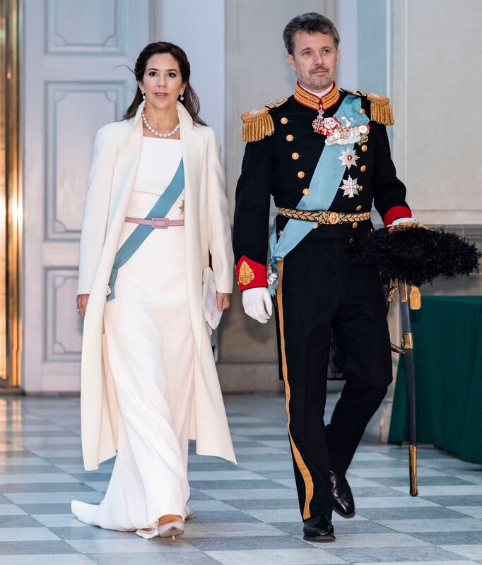 Celebrating Crown Princess Mary of Denmark's 50th birthday in 50 elegant day dresses and evening gowns: Princess Mary in white evening gown with white coat
