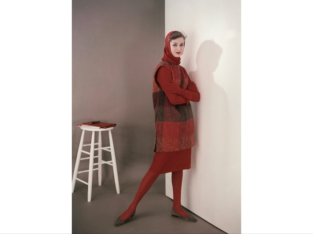Model in a wool dress by Mr. Mort Sportswear, pumps by I. Miller, Tiffany & Co. bracelet and clutchby Walter Katten glam , August 1958  © Frances McLaughlin-Gill