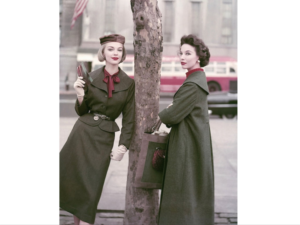 Gretchen Harris(left) in green suit by H. & E. Shapiro; Model on right wearing coat by Oppenheimer-Franken, August 1956 © Frances McLaughlin-Gill