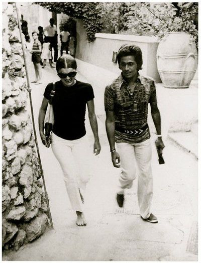 Jackie Kennedy Onassis  in white capri pants with Valentino Garavani in capri Italy 1970