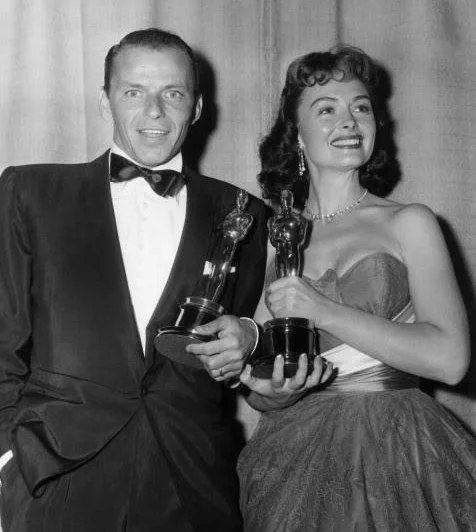 Donna Reed and Frank Sinatra with their Oscars for the film From Here to Eternity