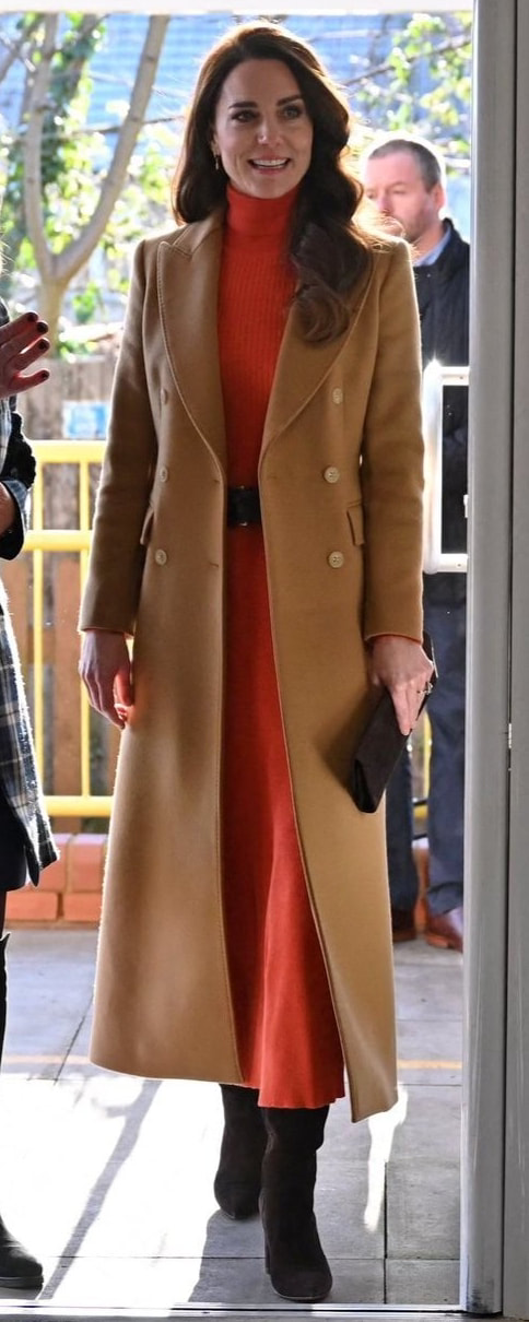 Kate Middleton in Massimo Dutti brown cashmere wool coat and Gabriela Hearst orange sweater skirt set, 18 Jan 2023. Getty Images