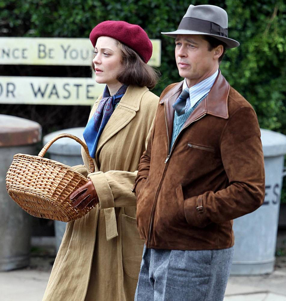 Marion Cotillard’s brown trench coat of wide lapel and burgundy beret in film Allied(2016)