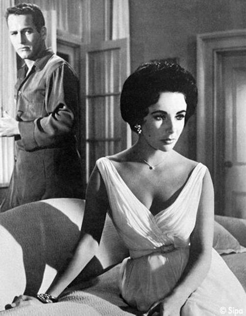Paul Newman in Cat on a Hot Tin Roof (1958)opposite Elizabeth Taylor