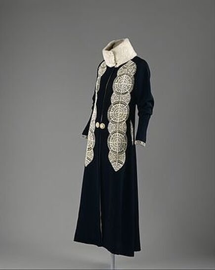 Paul Poiret coat in black wool with fur and leather applique (1919)