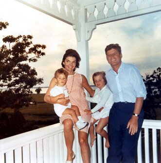 Jacqueline Kennedy and John Kennedy with their two children: daughter Caroline and son John Jr.