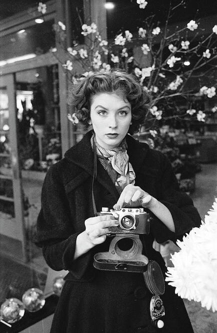 Suzy Parker with a camera by Peter Stackpole