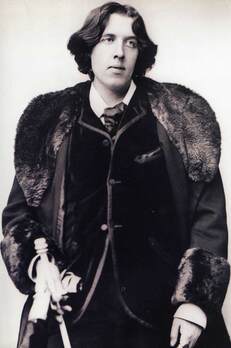The most elegant writer Oscar Wilde wearing double breast suit