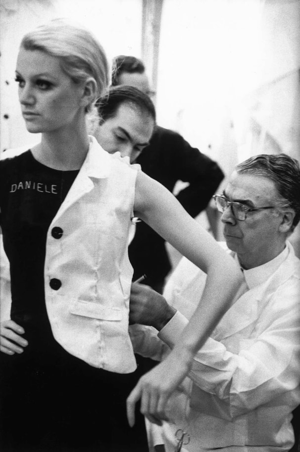 Cristobal Balenciaga working in his Paris studio with model