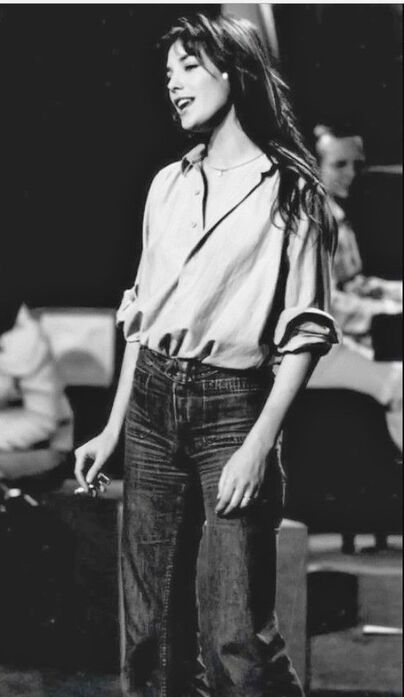 Elegant style icon wardrobe essentials: Jane Birkin in white shirt