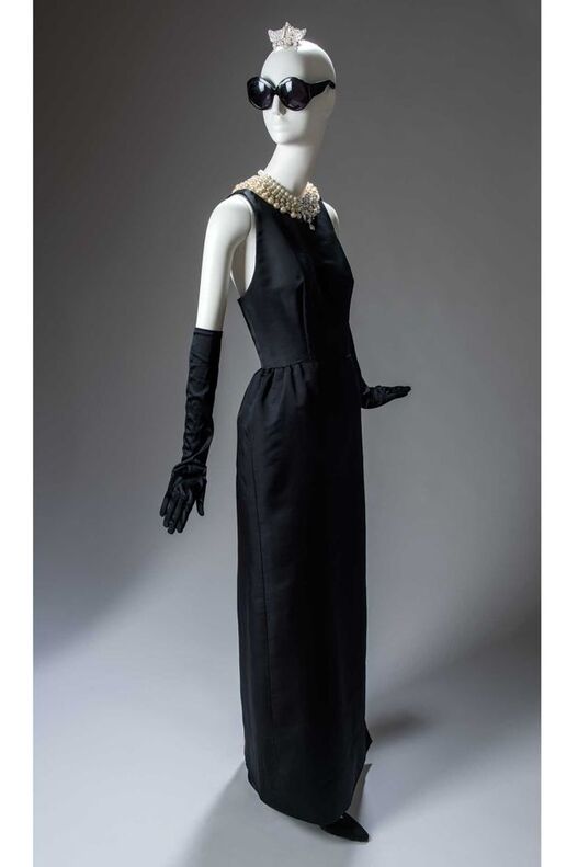 the black dress with back cutout worn by Audrey Hepburn in film Breakfast at Tiffany's, designed by Hubert de Givenchy