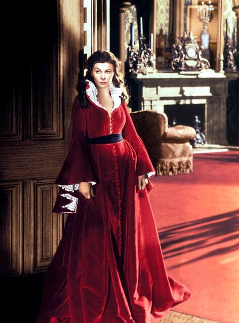 Vivien Leigh as Scarlet O’Hara in Gone with the Wind, wearing scarlet velvet gown