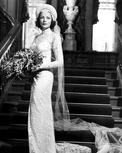 Gene Tierney wearing wedding gown designed by her husband Oleg Cassini in film The Razor's Edge(1946)