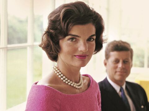 Jacqueline Kennedy with her husband John Fitzgerald Kennedy, wearing a pearl necklace