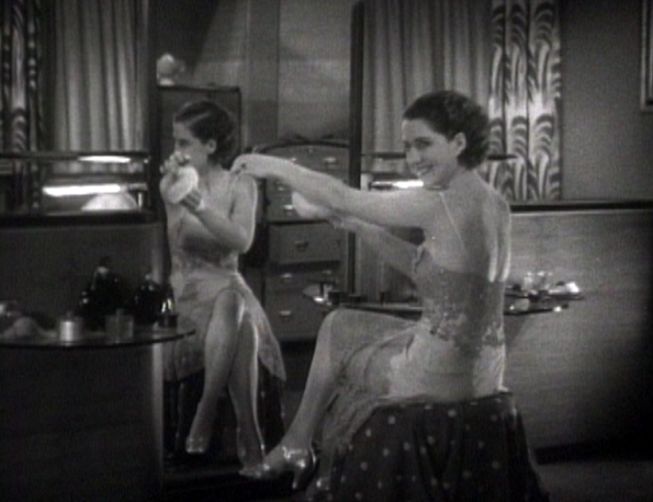 Norma Shearer in spaghetti strapped slip dress