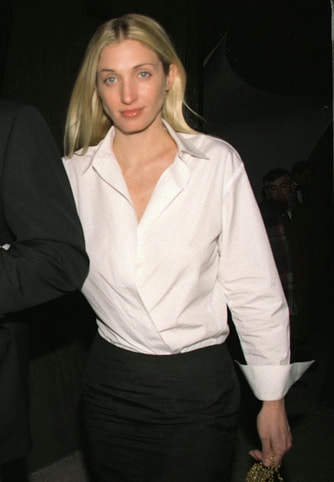 Elegant icon wardrobe essentials: Carolyn Bessette in white shirt