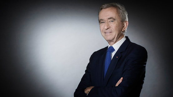 LVMH Chairmand and CEO Bernard Arnault elegant style in suits of navy blue
