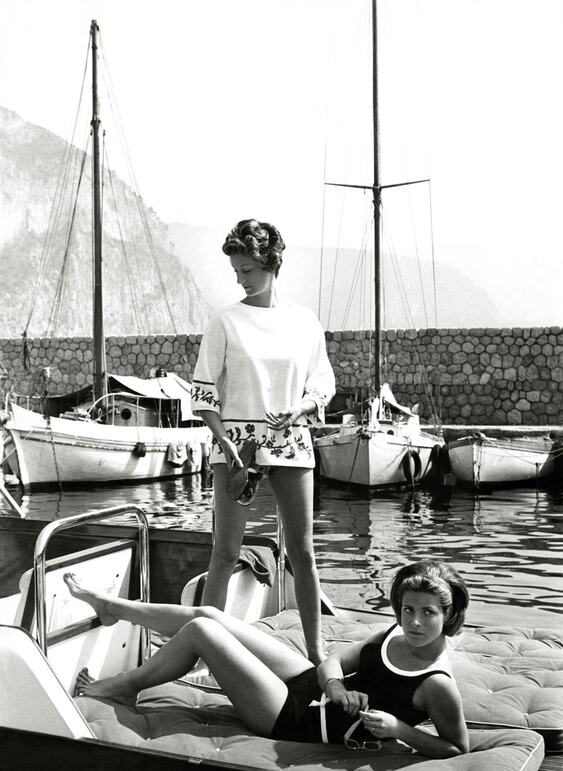 Marella Agnelli and Princess Pignatelli in the port of Beaulieu-sur-Mer on the Cote d’Azur. Photograph by Henry Clarke, Condé Nast, Getty Images