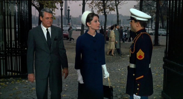 Audrey Hepburn movie costume Charade(1963) complete outfits as Reggie Lampert: the navy blue skirt suit with white pillbox hat and white gloves
