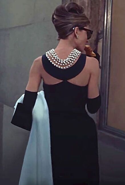 Audrey Hepburn in Givench black floor length dress in opening scene of Breakfast at Tiffany's 