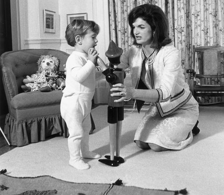 John F. Kennedy Jr. with his mother Jackie Kennedy