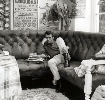Dirk Bogarde at his home