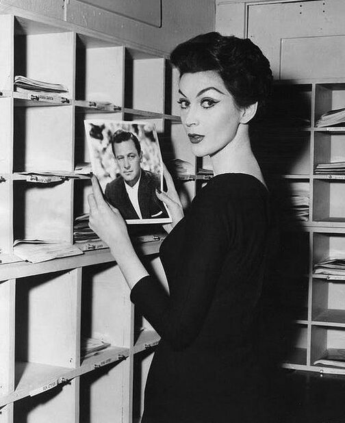 Dovima on the set of film Funny Face(1957) starring Audrey Hepburn and Fred Astaire
