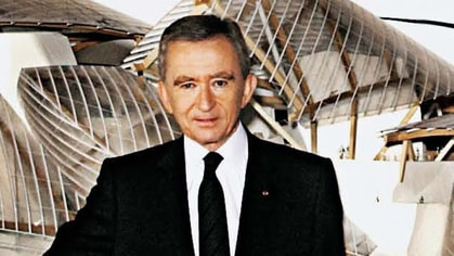 LVMH Chairman and CEO Bernard Arnault elegant style in suits of black