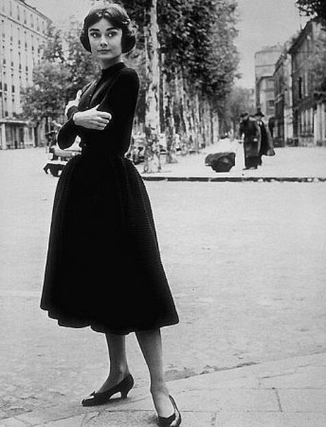 Elegant style icon wardrobe essentials: Audrey Hepburn in little black dress: Audrey Hepburn in black dress in film Funny Face(1957)