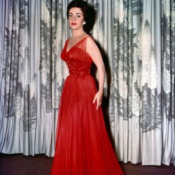 Elizabeth Taylor in red gown in film The Last Time I saw Paris(1954), designed by Helen Rose
