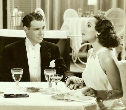 Dolores del Río with Everett Marshall in film I Live for Love, (1935)