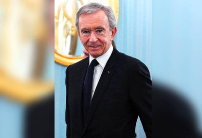 LVMH Chairman and CEO Bernard Arnault elegant style in suits of black