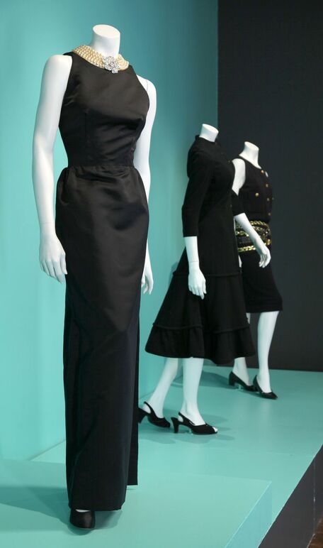 the black dress with back cutout worn by Audrey Hepburn in film Breakfast at Tiffany's, designed by Hubert de Givenchy