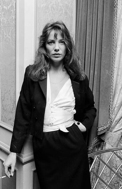 Elegant style icon wardrobe essentials: Jane Birkin in white shirt, 1982