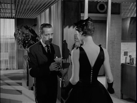 Audrey Hepburn with Humphrey Bogart in film Sabrina(1954)