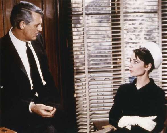 Cary Grant and Audrey Hepburn in Charade (1963), directed by Stanley Donen. © 1963 Universal Pictures Company, Inc.
