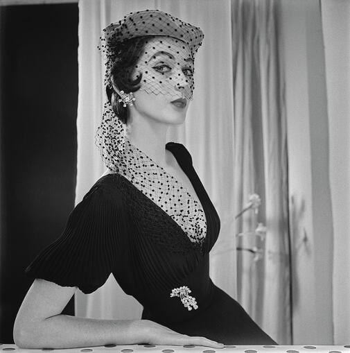 Dovima(1927-1990) in black dress, elegancepedia