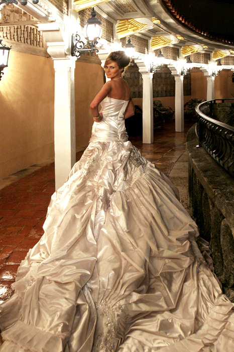 Melania Trump in her wedding gown made by John Galliano of the house of Christian Dior