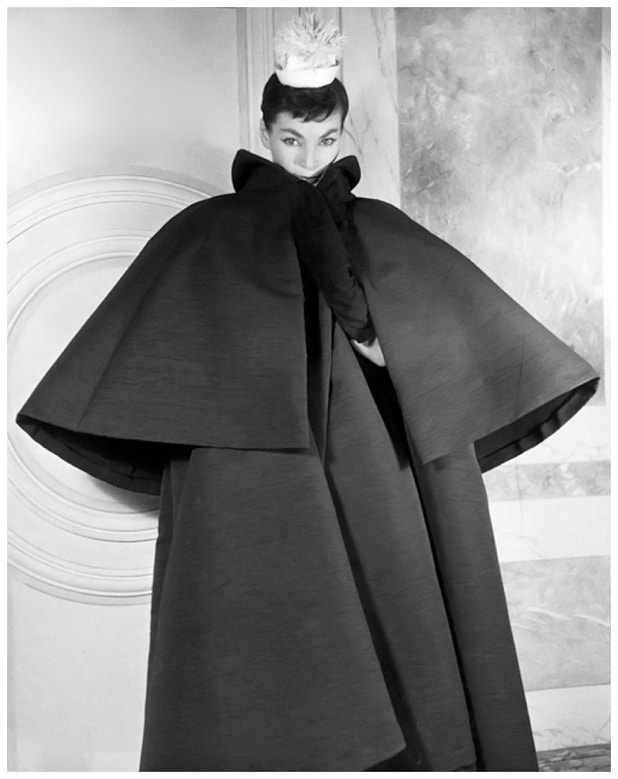 Luki in Cardinal Coat designed by Cristóbal Balenciaga, photo by Louise Dahl-Wolfe, 1953