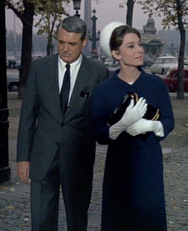 Audrey Hepburn movie costume Charade(1963) complete outfits as Reggie Lampert: the navy blue skirt suit with white pillbox hat and white gloves