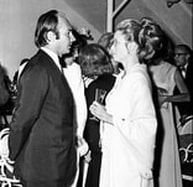 Prince Aly Khan with Princess Grace Kelly on a party in Marbella Spain
