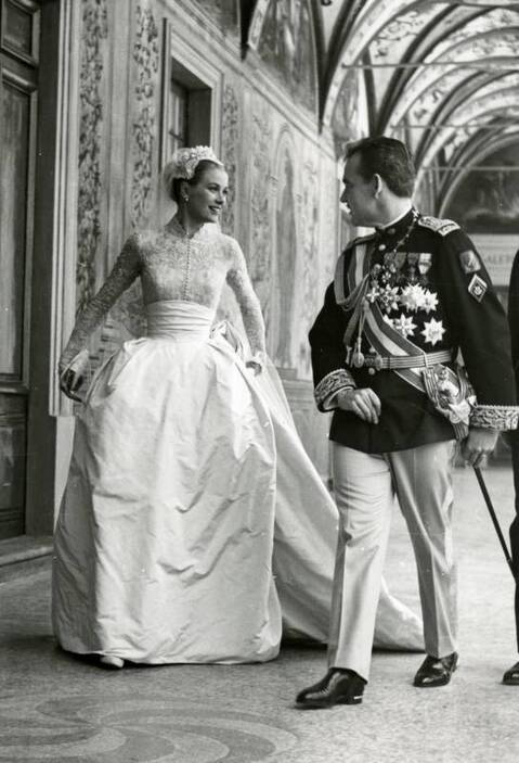 Grace Kelly with Prince Rainier at their wedding ceremony, 1956