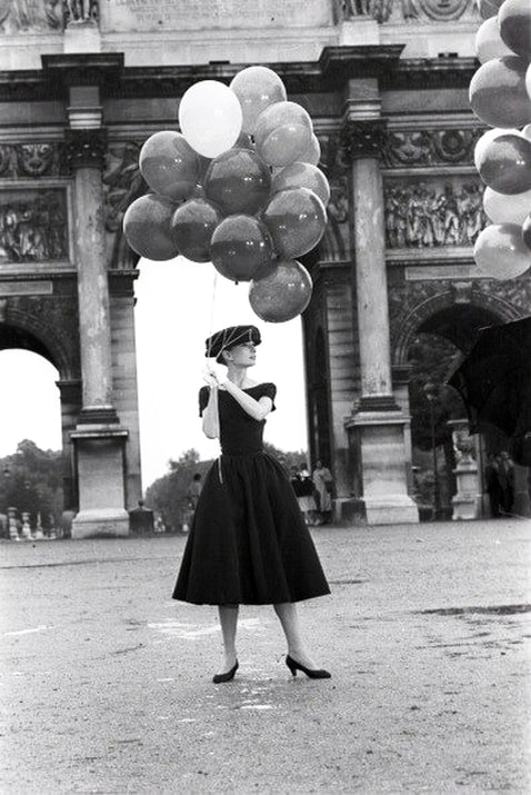 Elegant style icon wardrobe essentials: Audrey Hepburn in little black dress in film Funny Face(1957)