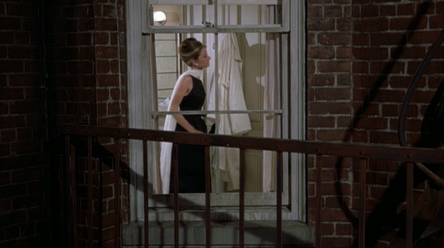 Audrey Hepburn movie costume in film Breakfast at Tiffany's(1961), the complete wardrobe of Holly Golightly:Black floor length sleeveless dress with moonlike back cut-out