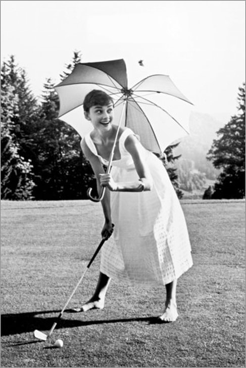 Audrey Hepburn in sleeveless white summer dress