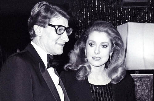 Catherine Deneuve with French couturier and fashion designer Yves Saint Lawrent