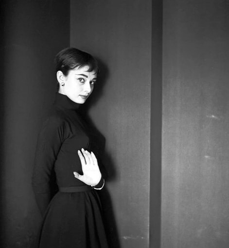 Elegant style icon wardrobe essentials: Audrey Hepburn in little black dress, photo by Cecil Beaton, 1955