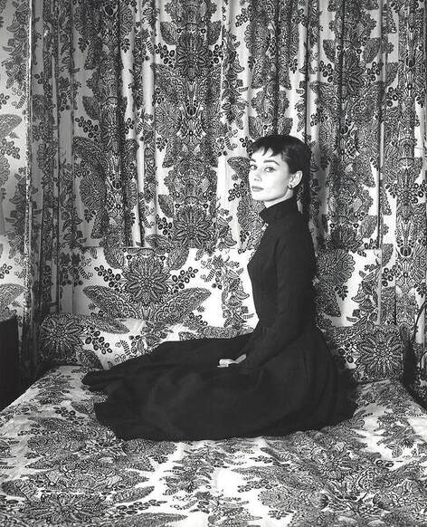 Elegant style icon wardrobe essentials: Audrey Hepburn in little black dress, photo by Cecil Beaton, 1955