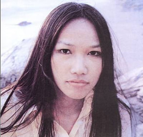 photo of Mayumi Itsuwa 五輪真弓 as young girl with long hair